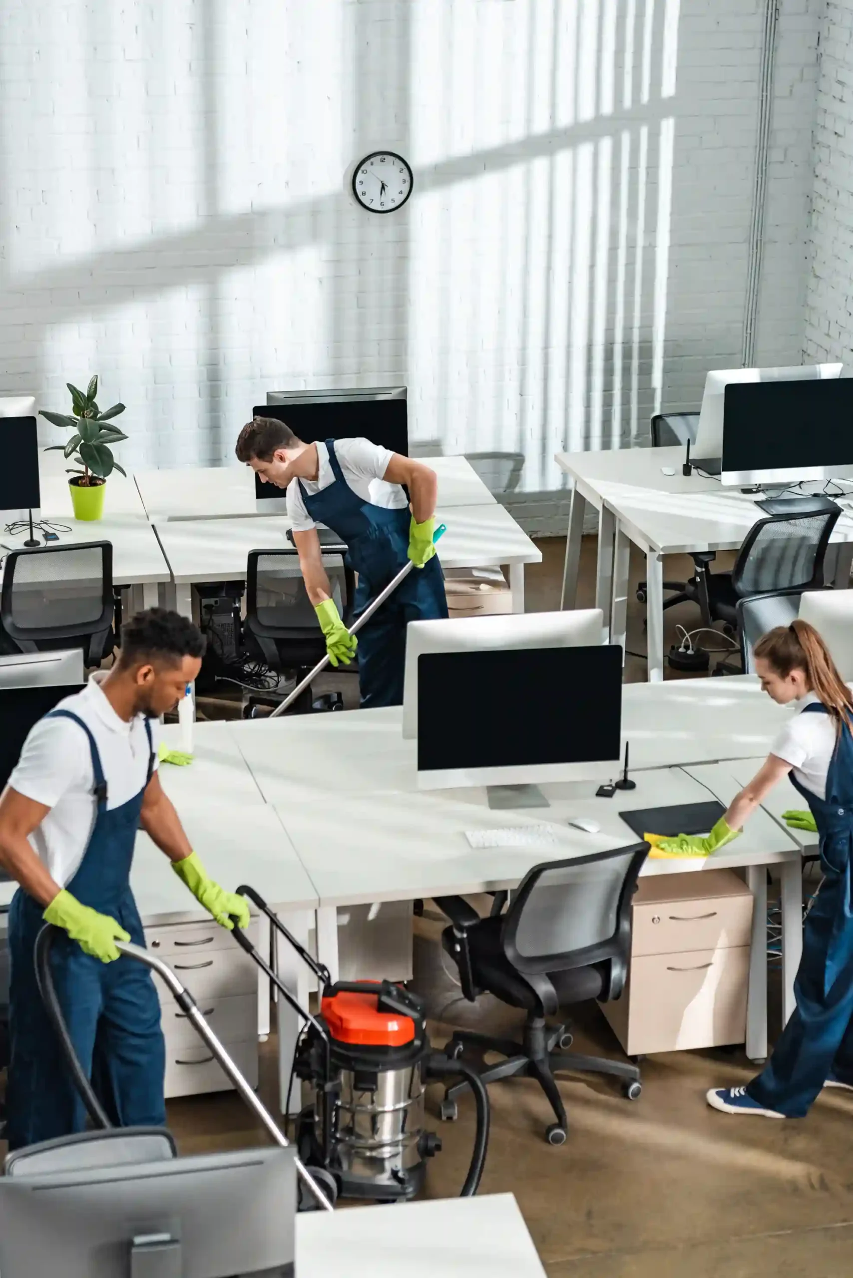 Premium Office Cleaning in Wellington multicultural-team-of-cleaners-working-in-moder-