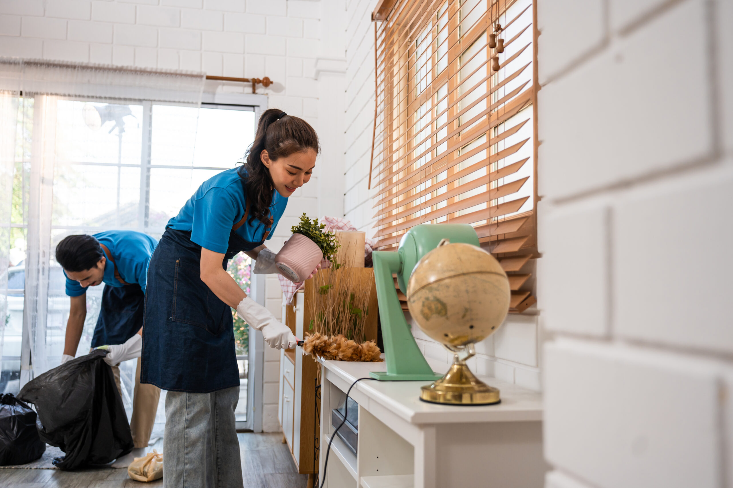 House Cleaning Services Highland Park TX asian-young-man-and-woman-cleaning-service-worker-2025-03-25-07-03-29-utc (1)