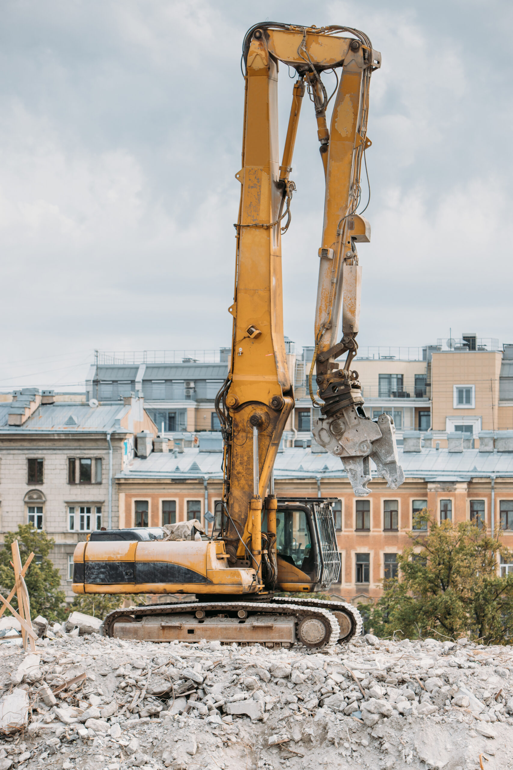 Demolition Services ST Helena CA Demolition of building with excavator-destroyer for high-altitud