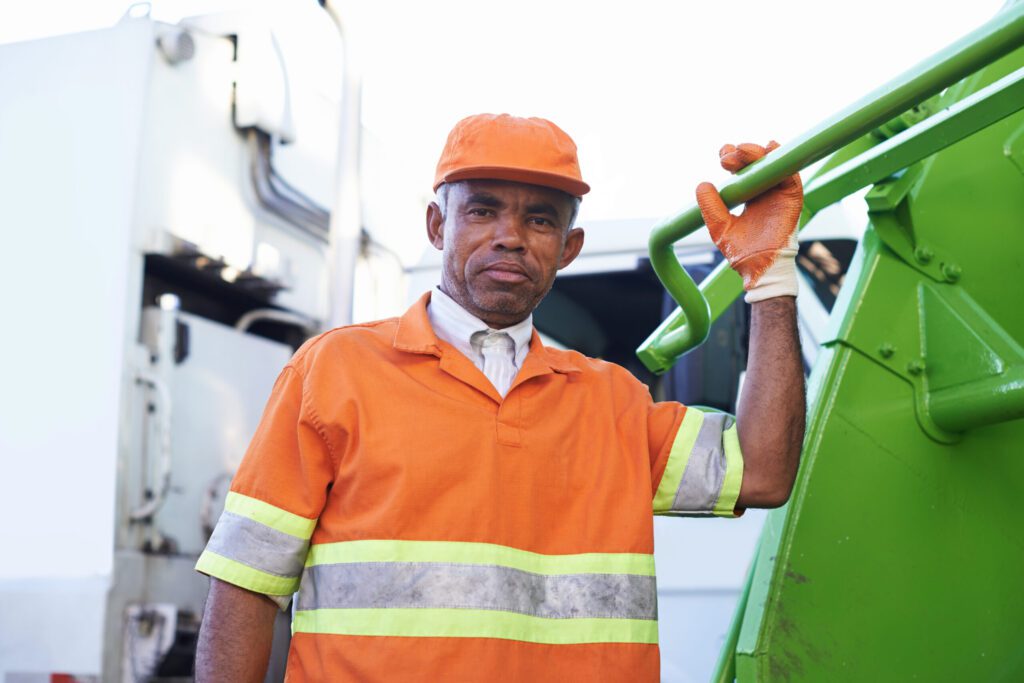 Hauling Services in Burbank CA Hes keeping our streets clean. Cropped shot of a male worker on garbage day