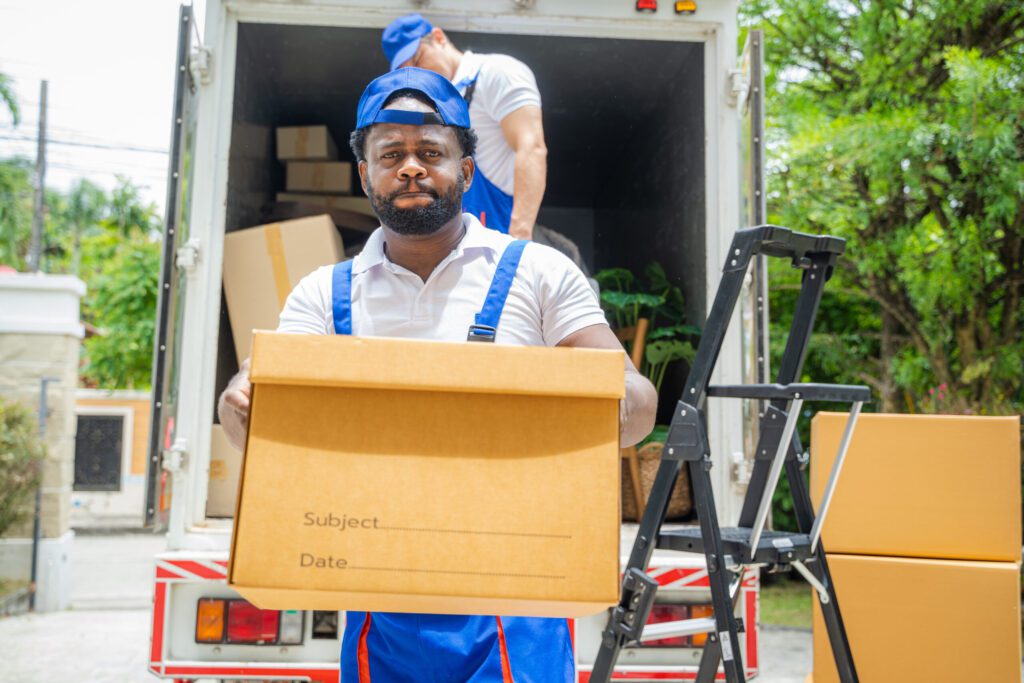 Trusted Movers in Upland, CA moving-service-workers-unloading-boxes-and-checkin-2025-01-08-06-31-32-utc